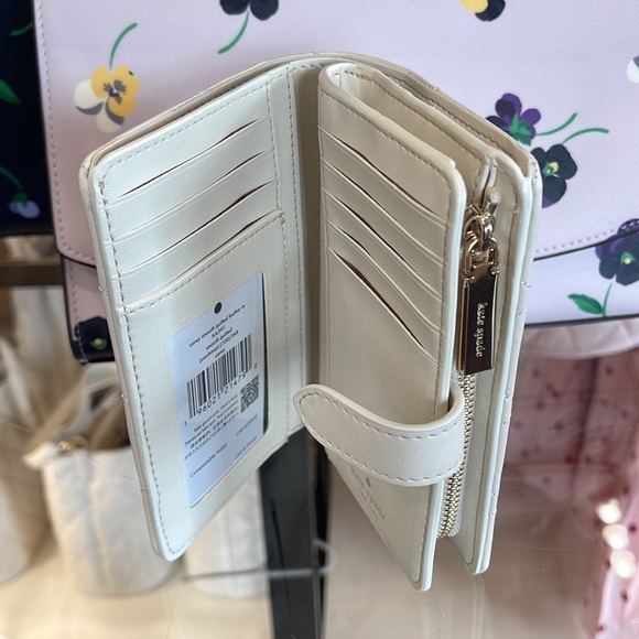 Kate Spade Carey Medium Compartment Bifold Wallet 
COLOR: Parchment - Picture 5 of 16